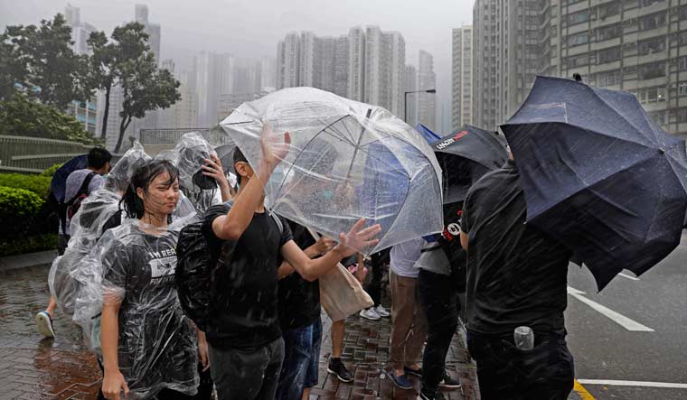 Hong Kong Braces for Torrential Rain and Cyclone Wipha